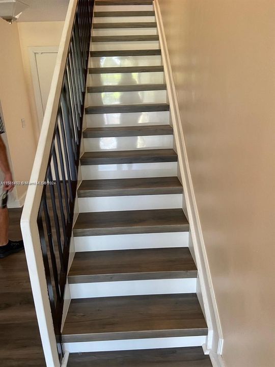New Staircase flooring on steps with water proof vinyl flooring
