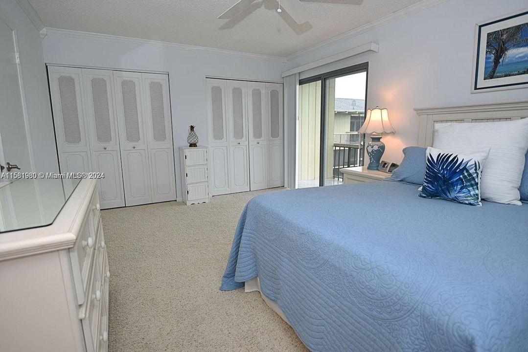 Master bedroom with private bath and balcony