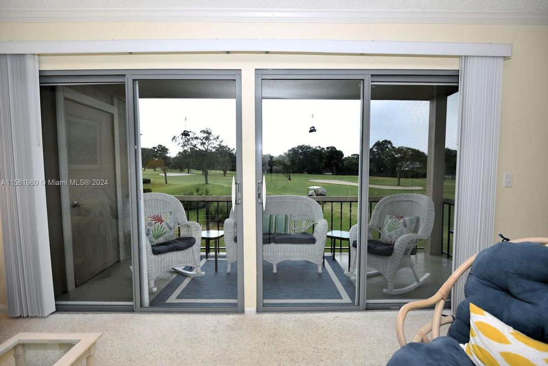 Living dining area with private balcony