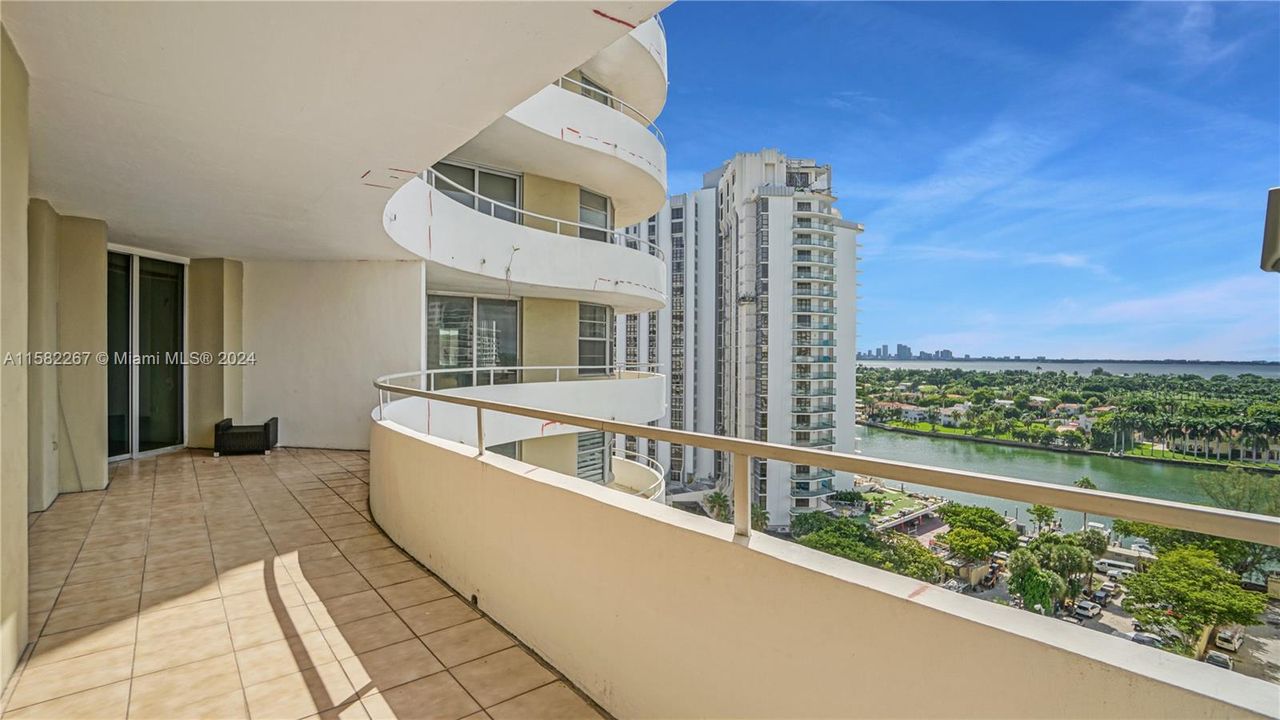 Balcony overlooking city of Miami Beach