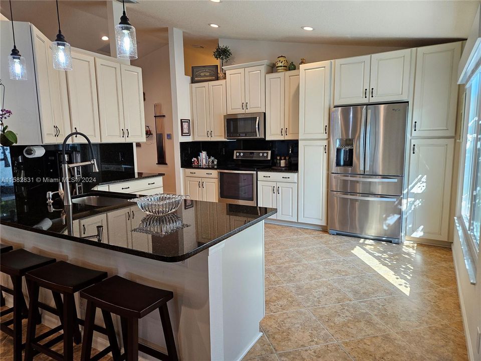 Granite Countertops, Stainless Steel Appliances, Four Draw Refrigerator