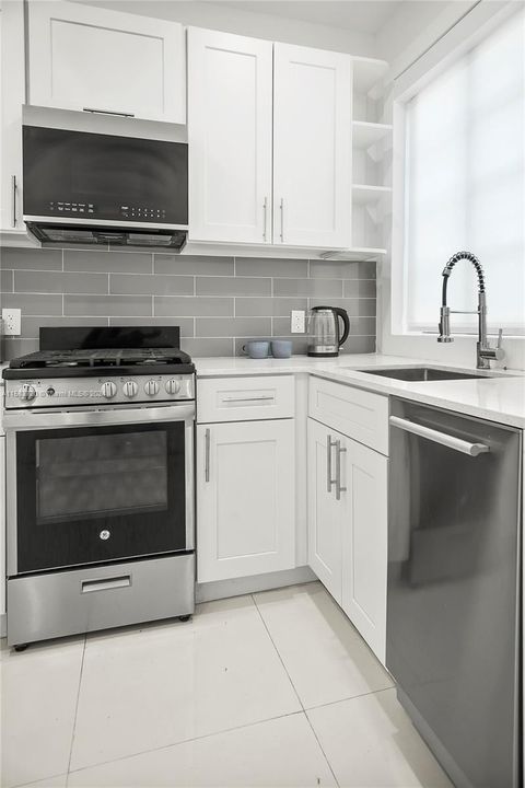 Kitchen - Gas stove and Dishwasher