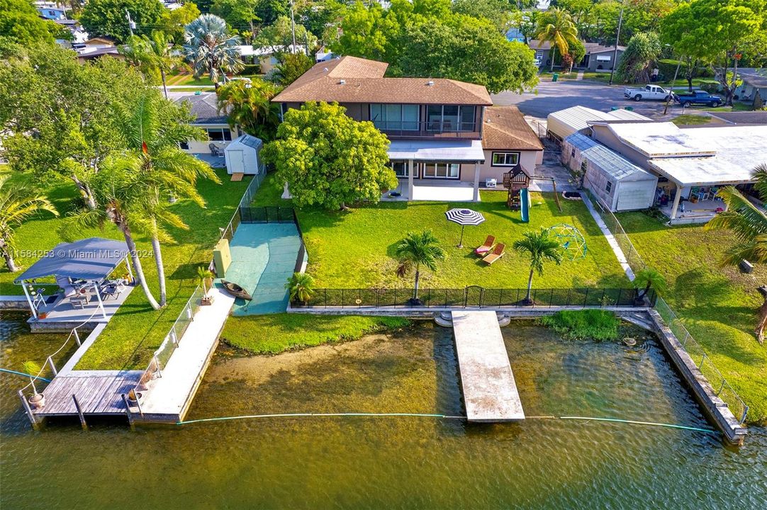 Lakefront with boat ramp and piers