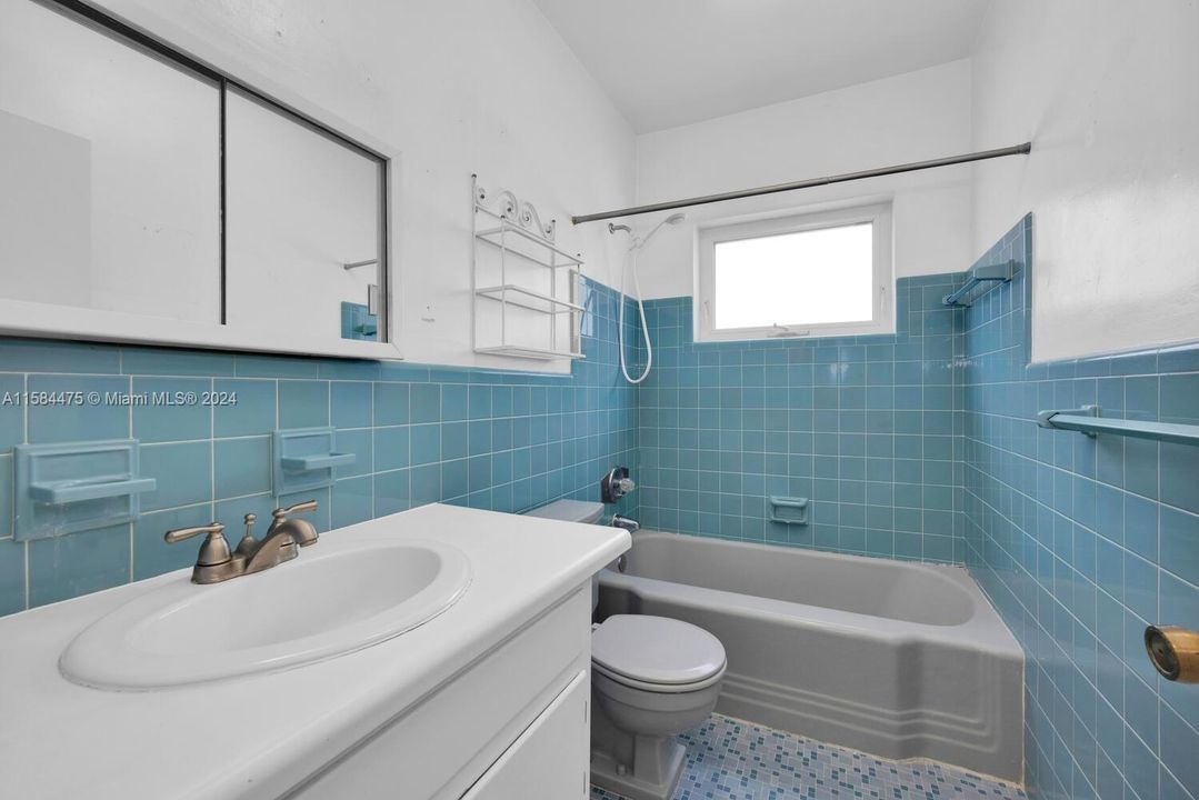 Bathroom #2 is convenient shared with both guest bedrooms.