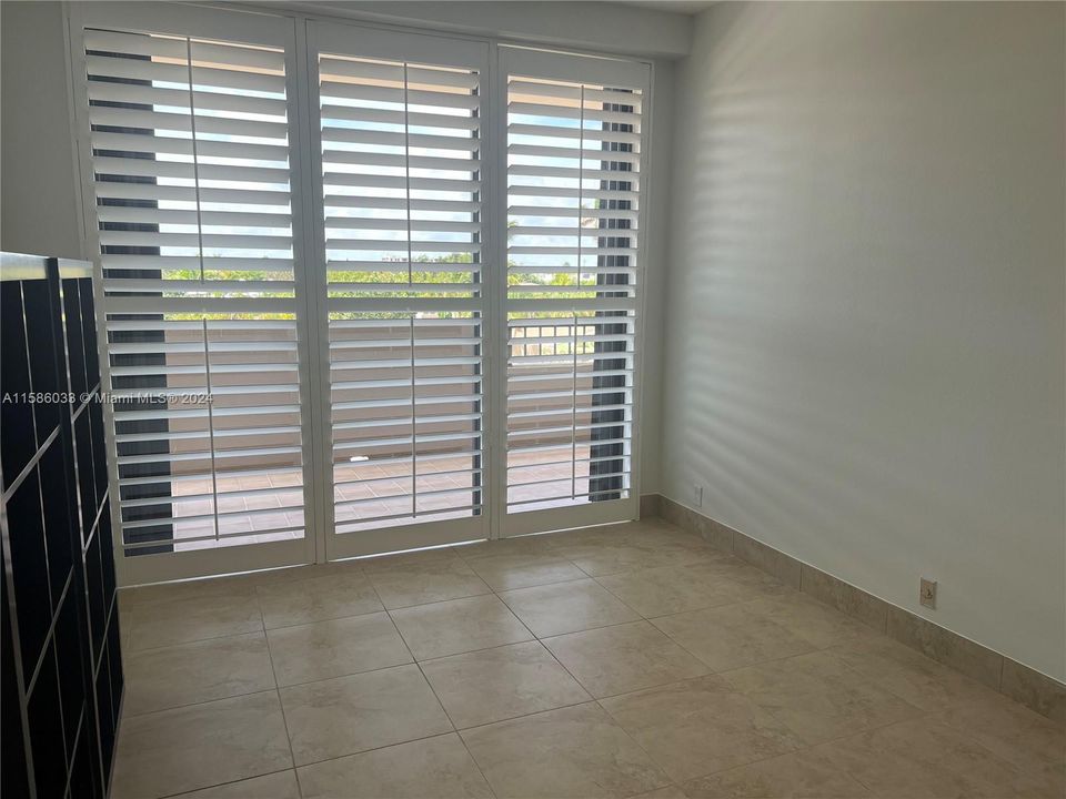 2 nd bedroom wood bahamian shutters