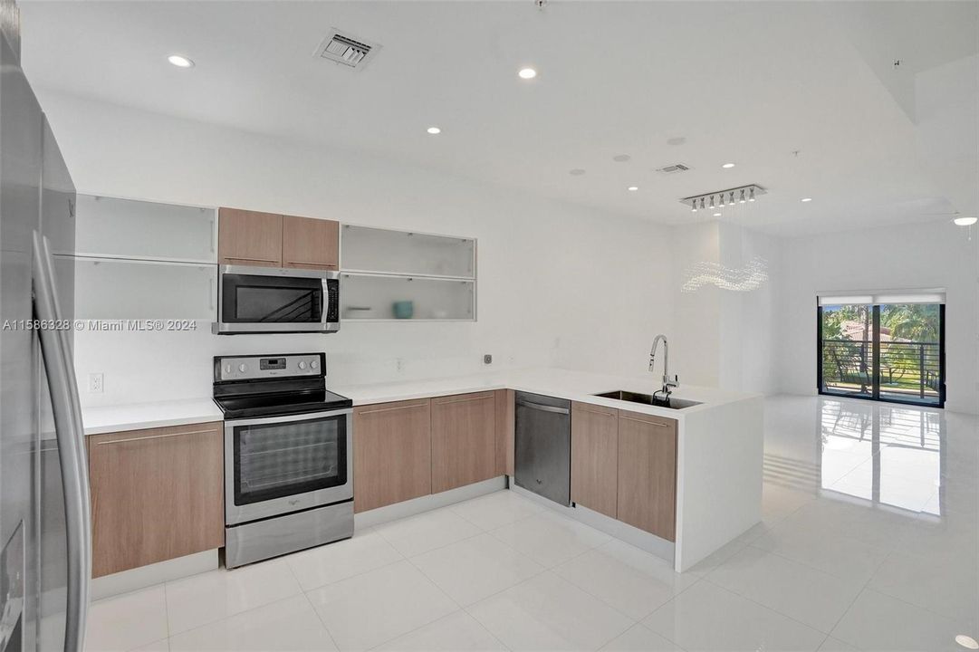 Kitchen and Living level with amazing balcony and water view