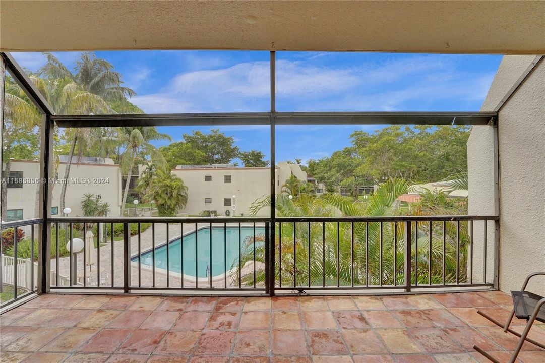 LARGE BALCONY OVERLOOKING THE POOL