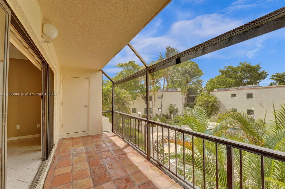 THE PRIMARY BEDROOM LEADS TO THE BALCONY