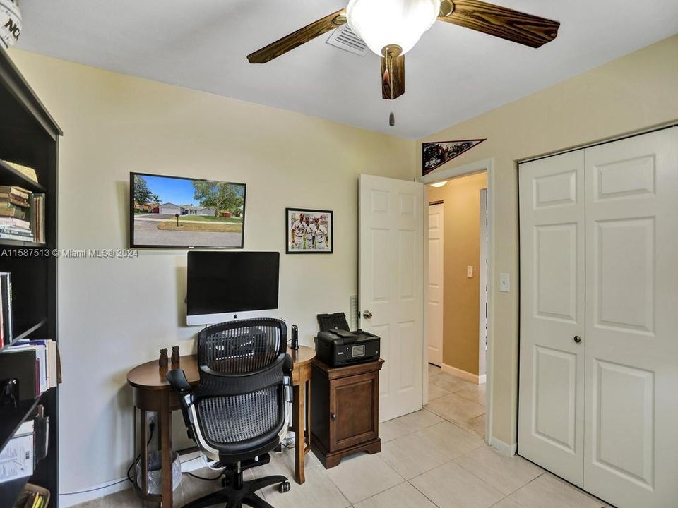 4th bedroom doubles as a huge office with lovely sitting area