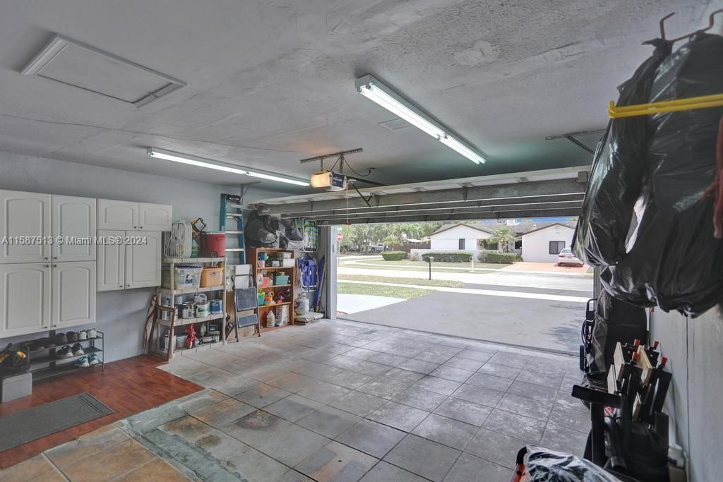 Immaculate garage fits 2 cars and has lots of storage