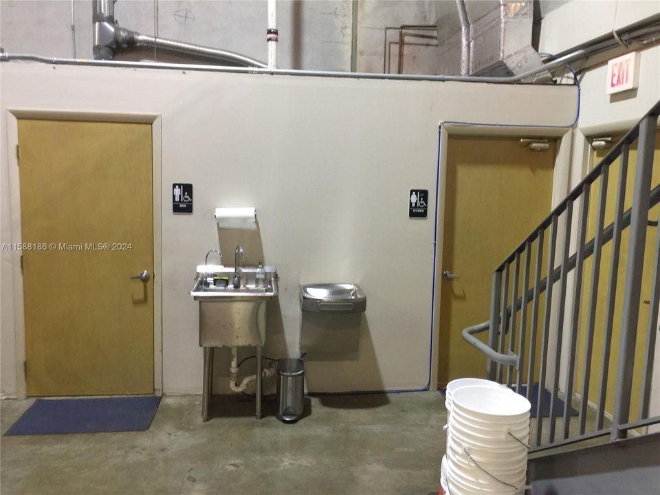 2 well appointed bathrooms in warehouse next to office