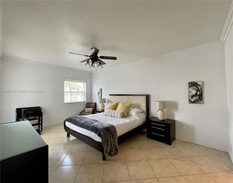 Spacious Master bedroom with patio access
