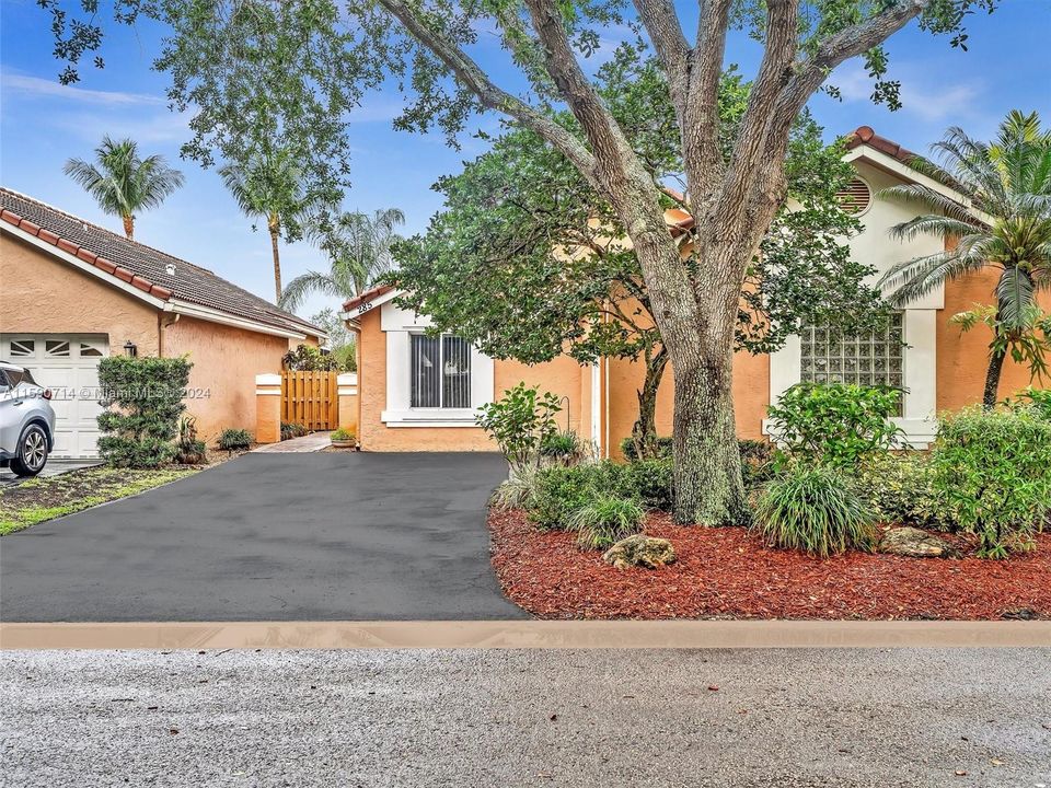 Front with long driveway