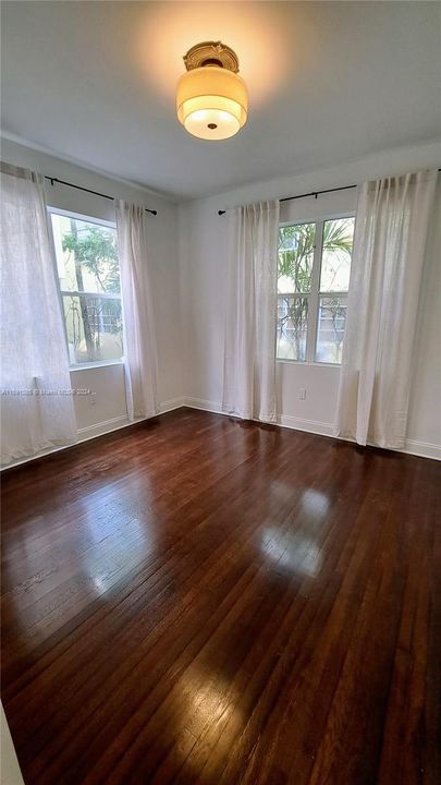 Spacious Corner Bedroom 1