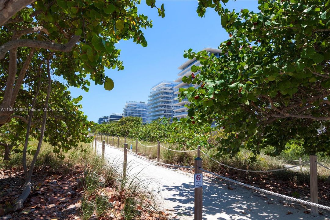 Beach path south with Four Seasons in the background.