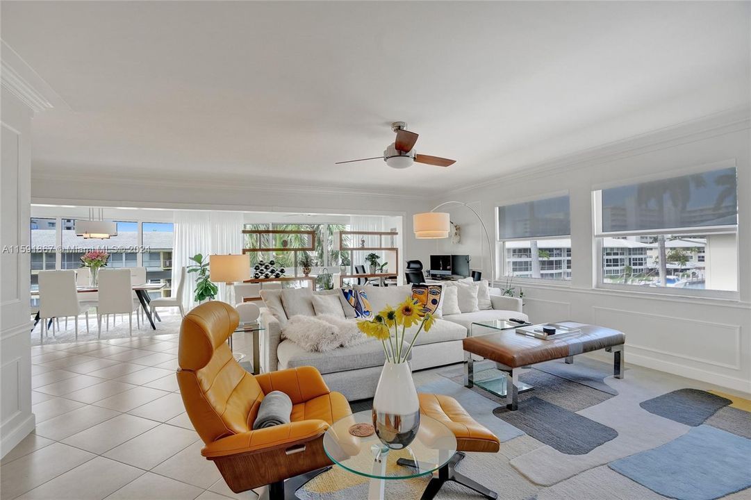 Living area overlooking Canal, dock and boats.