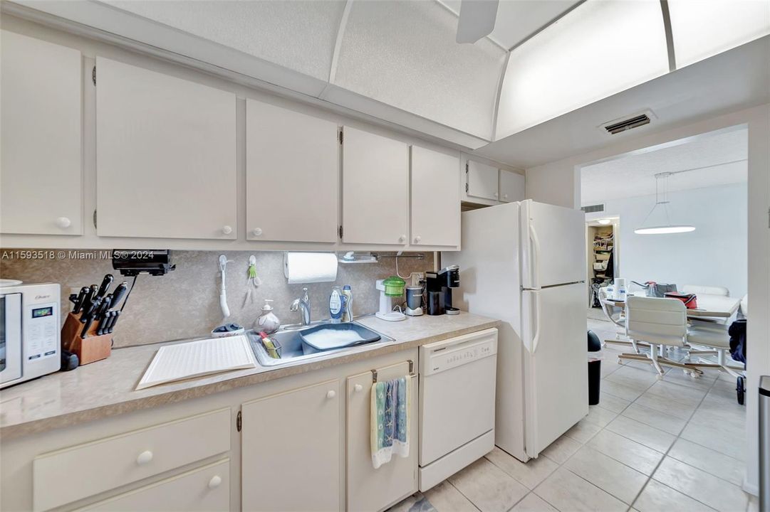 Kitchen adjacent to dining room