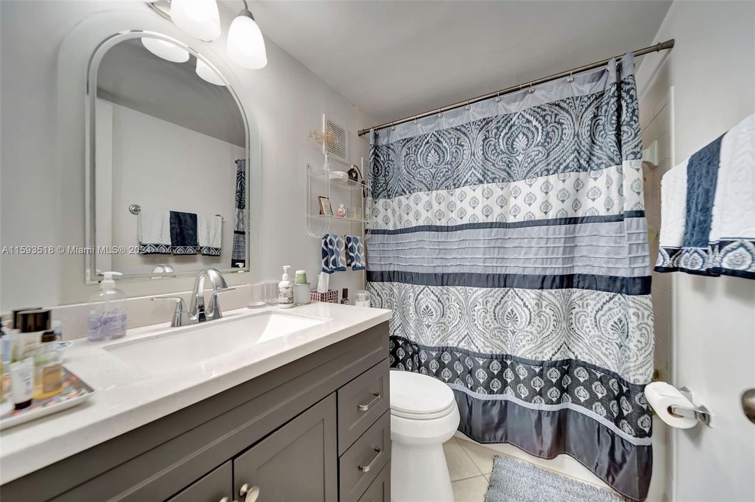 Guest bathroom with new vanity and tub/shower