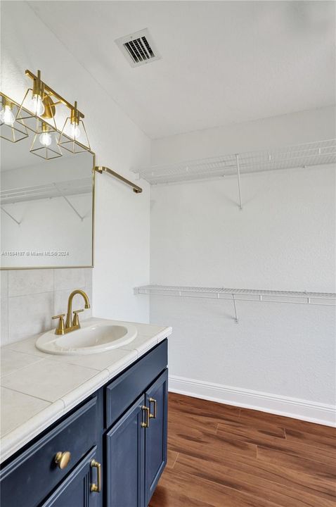 2nd bed has Jack and Jill bathroom and private separated powder area for busy mornings. And walking closet with window.