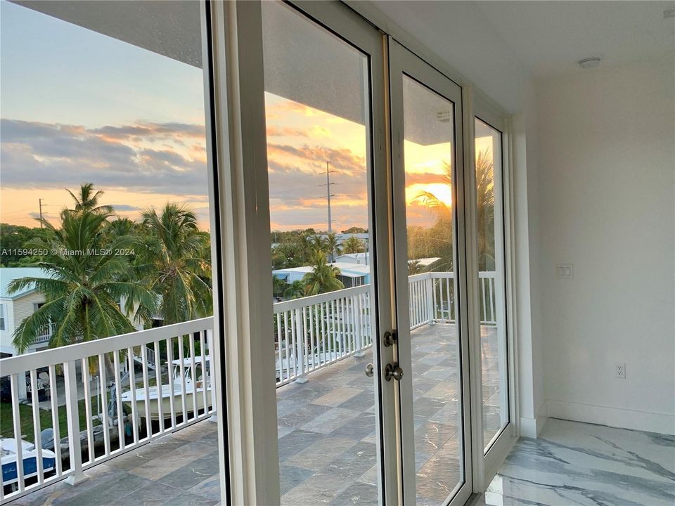 Incredible Sunset views! Facing South, access to balcony.