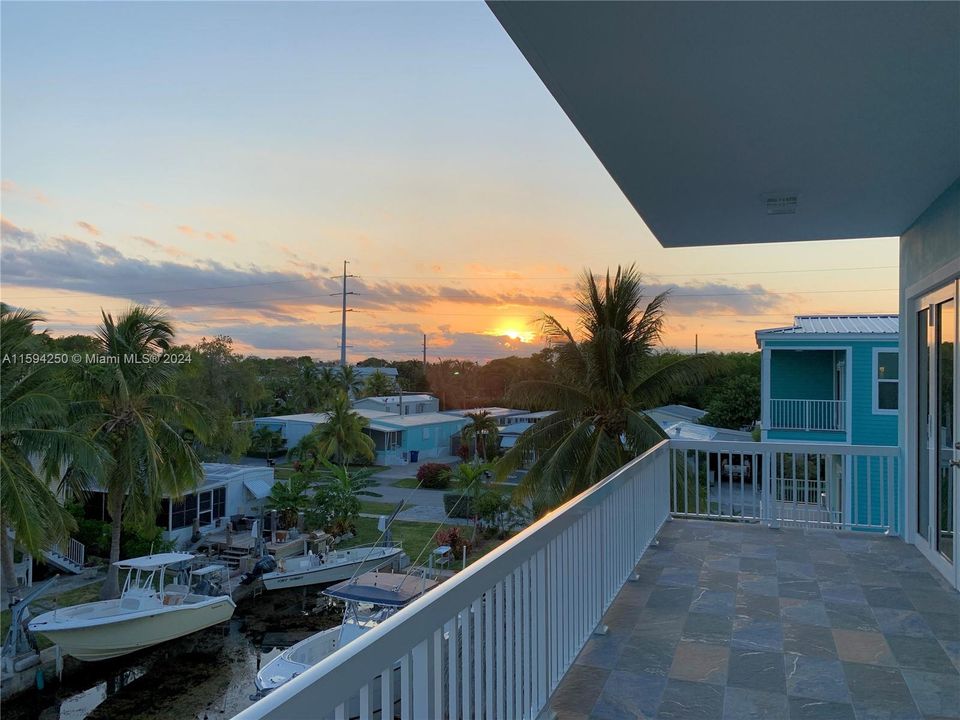 Sunset View from Family Room and Master Bedroom.