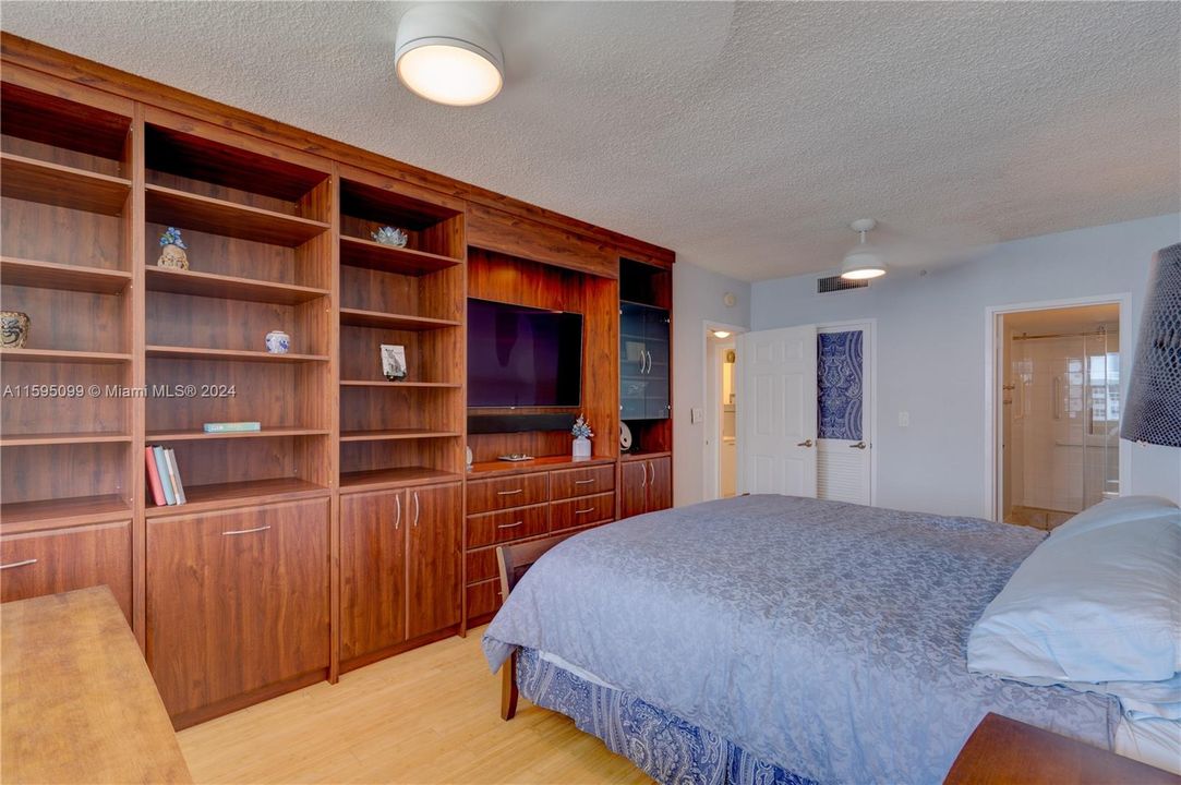 Primary bedroom with built ins.