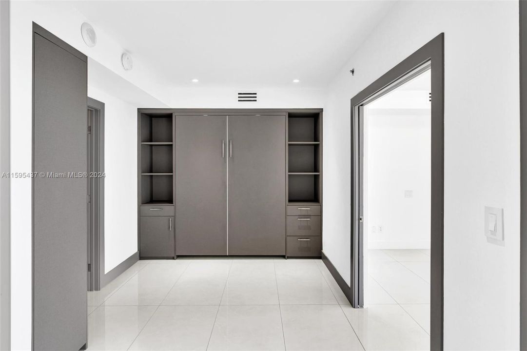 BONUS ROOM CAN BE USED FOR OFFICE, PLAYROOM, GUEST ROOM. HAS A CUSTOM BUILT IN MURPHY BED FOR YOUR GUESTS!