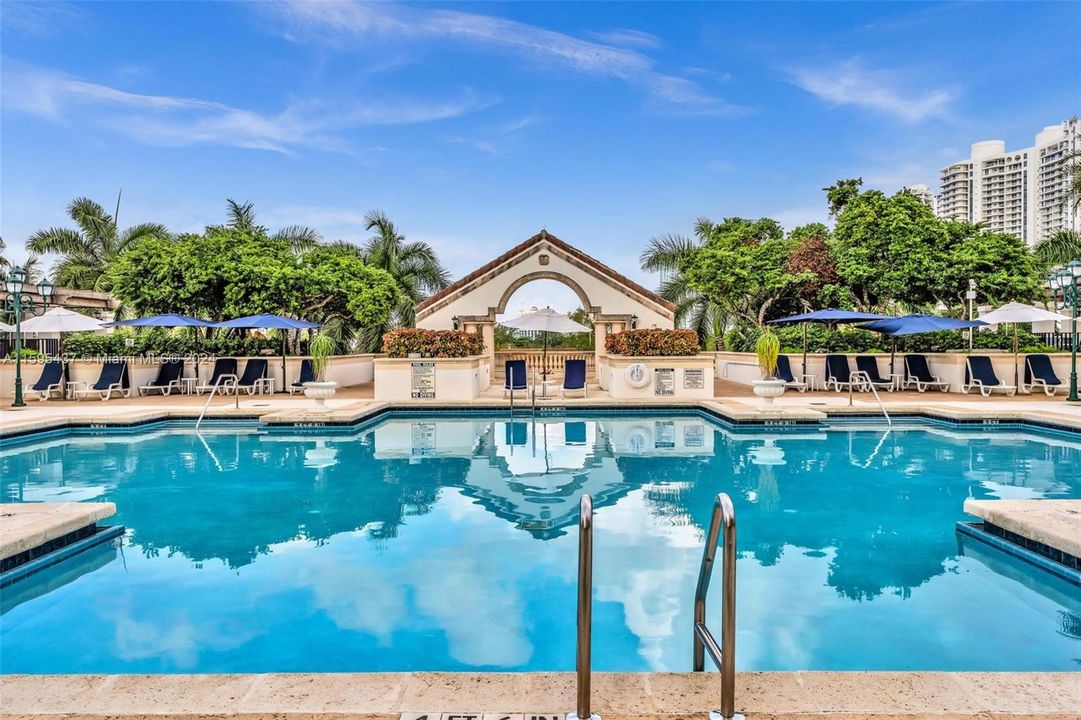 RESORT STYLE POOL WITH TOWEL SERVICE