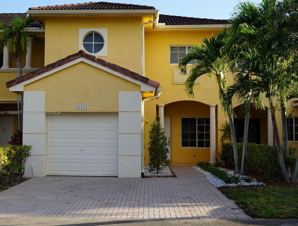 HOUSE FRONT AND GARAGE