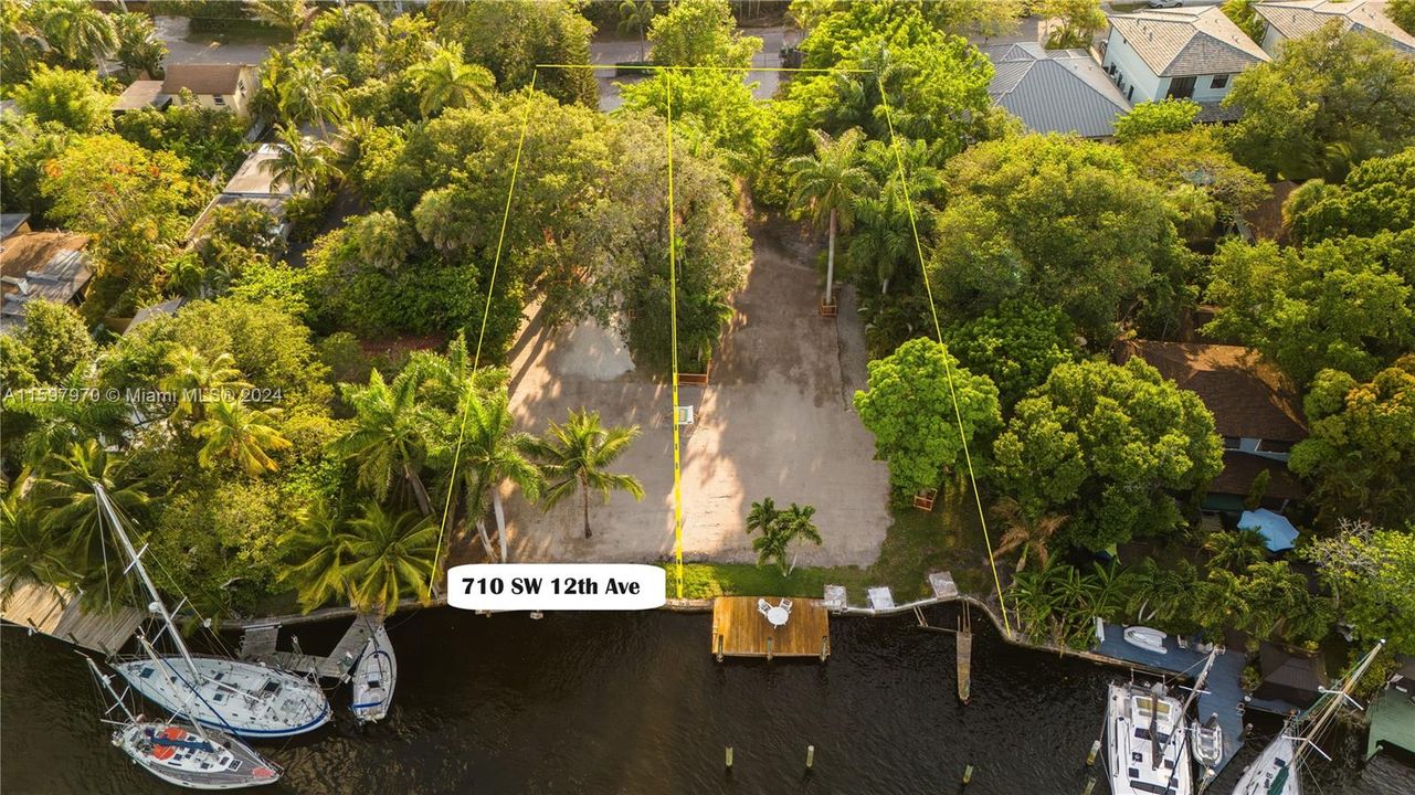 Listed lot is on left. 710 SW 12th Ave