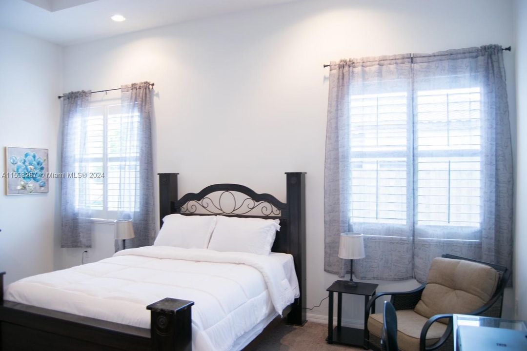 The master bedroom offers a generous size