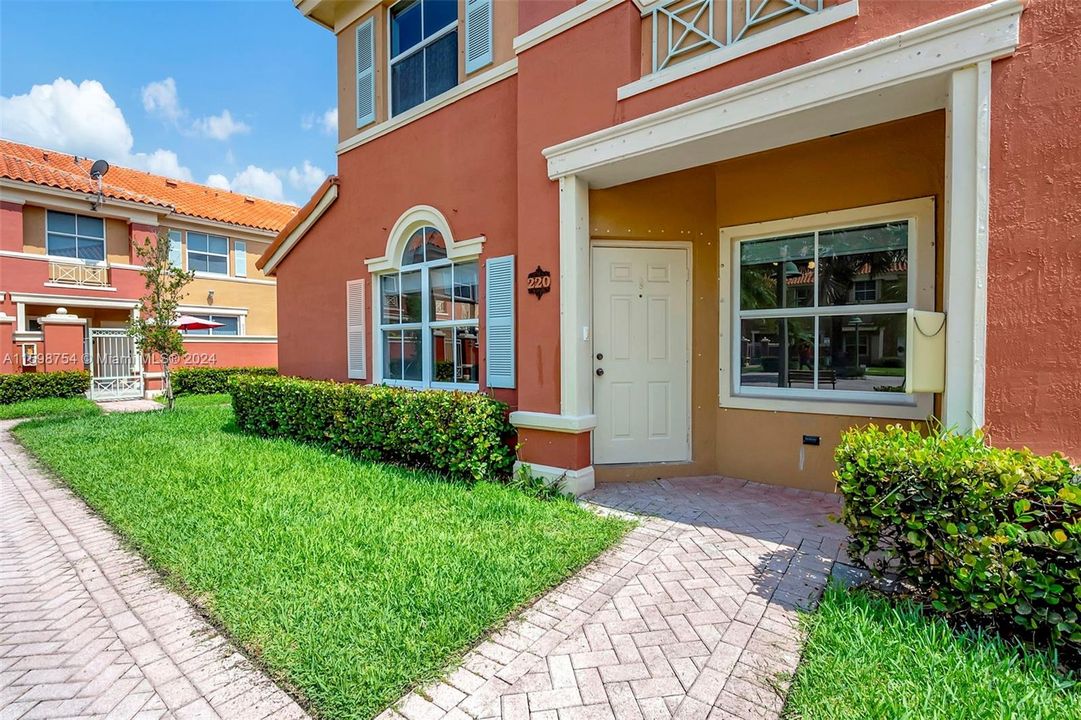 Front exterior and entrance to townhouse