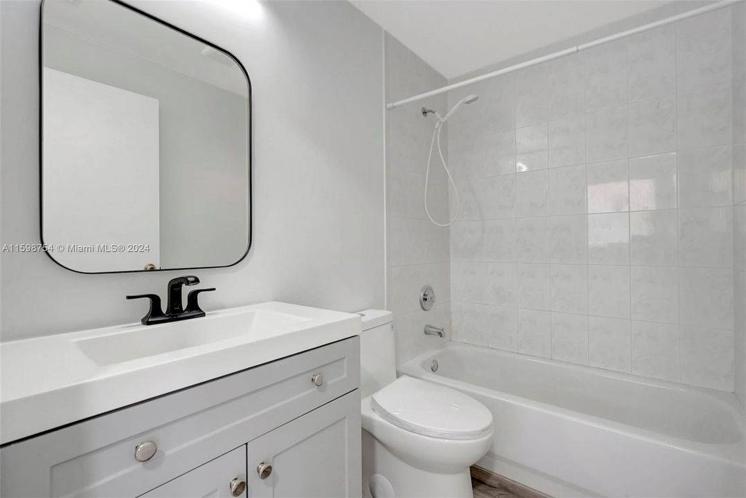 New cabinetry and toilet