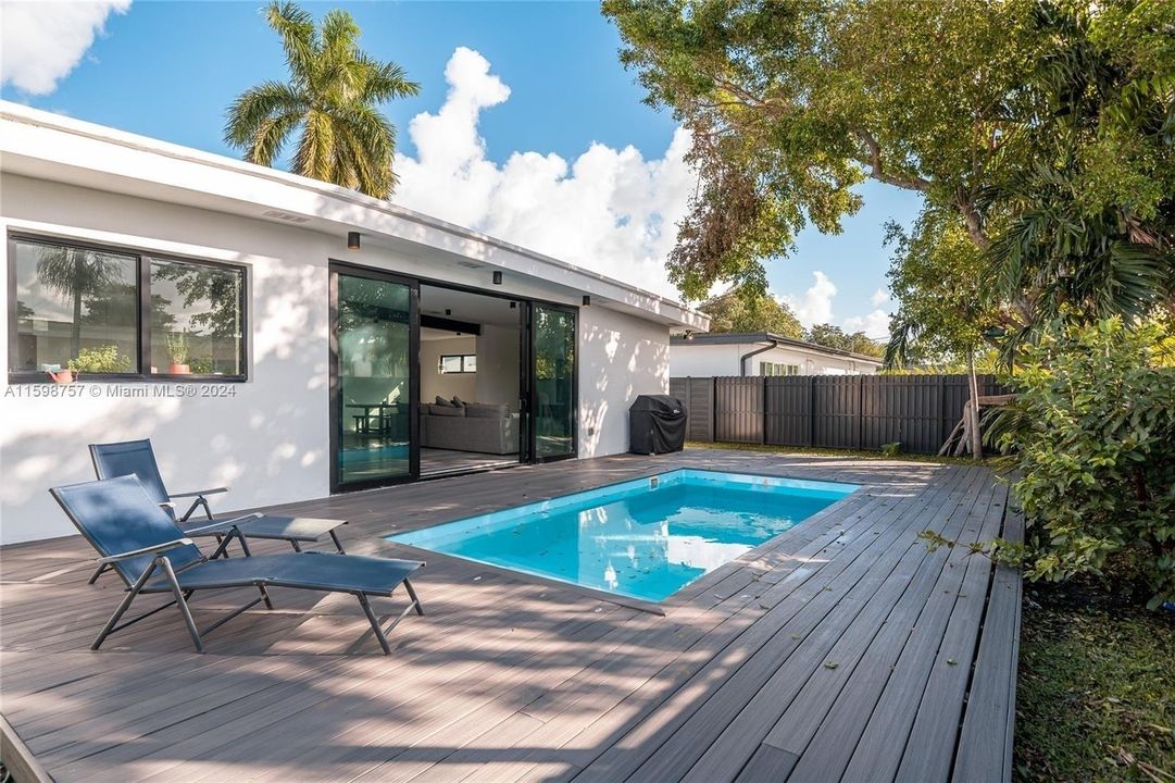 Relax in the backyard patio with a 10x20 pool