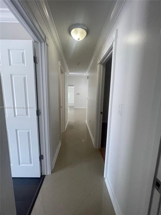 Hallway exiting bedrooms