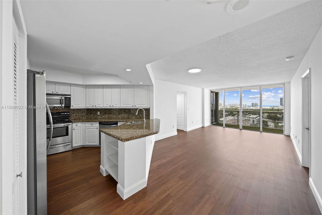 View from front door of kitchen and living room.