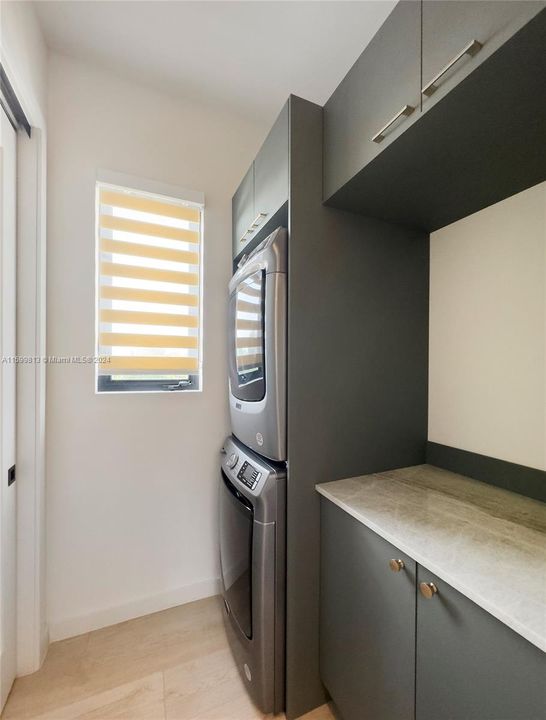 Laundry Room: This well-organized laundry room is both practical and stylish, offering ample storage and counter space to make laundry chores a breeze.