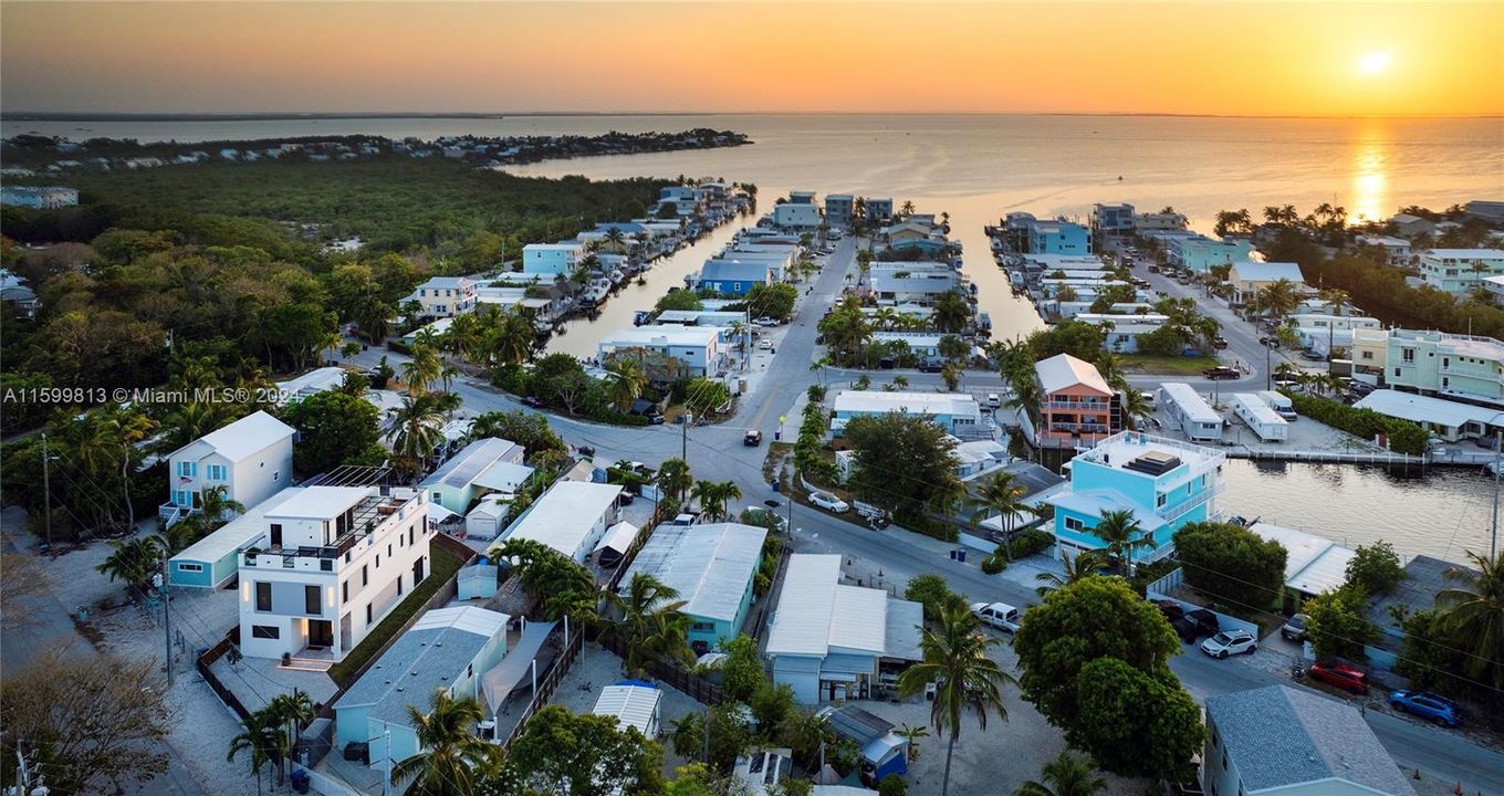 Neighborhood and Sunset View: Nestled in a picturesque coastal community, this home offers breathtaking sunset views over the serene waters. Put your boat in the water at the neighborhood boat ramp and head out to watch the sun melt into the water. Experience the beauty of Florida living at its finest.