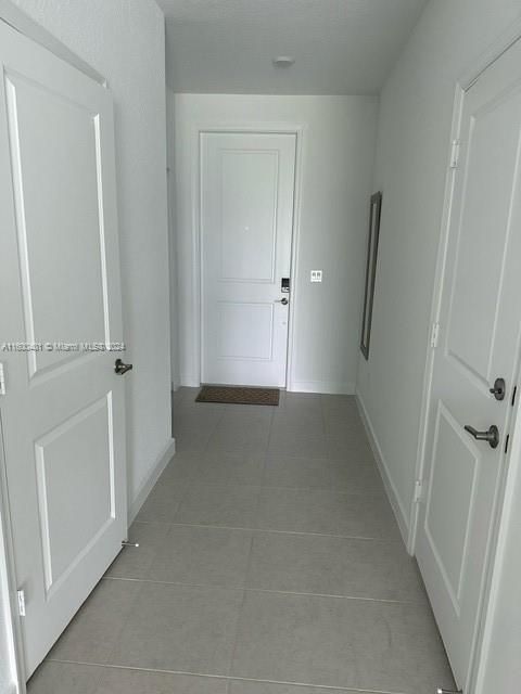 Doors to garage (L) and powder room (R)