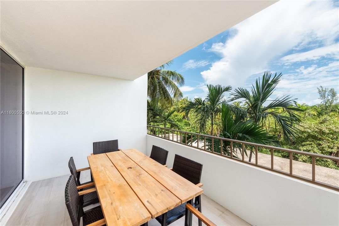 RENOVATED KITCHEN WITH STAINLESS STEEL APPLIANCES.