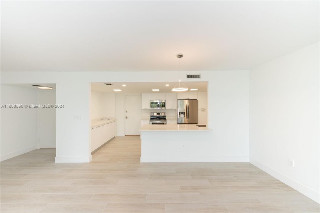 RENOVATED OPEN KITCHEN WITH BAR