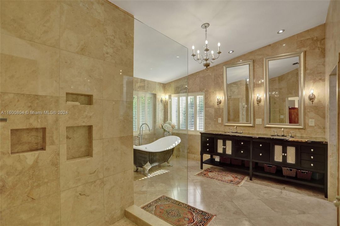 ensuite polished marble master bath