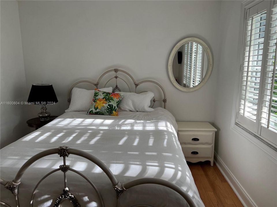 morning sunlight draws patterns in the  5th bedroom