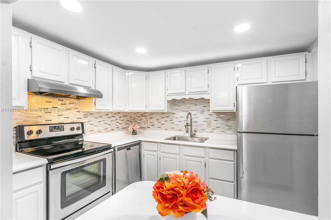 New High hat lighting, New Sink & Faucet and SS Appliances