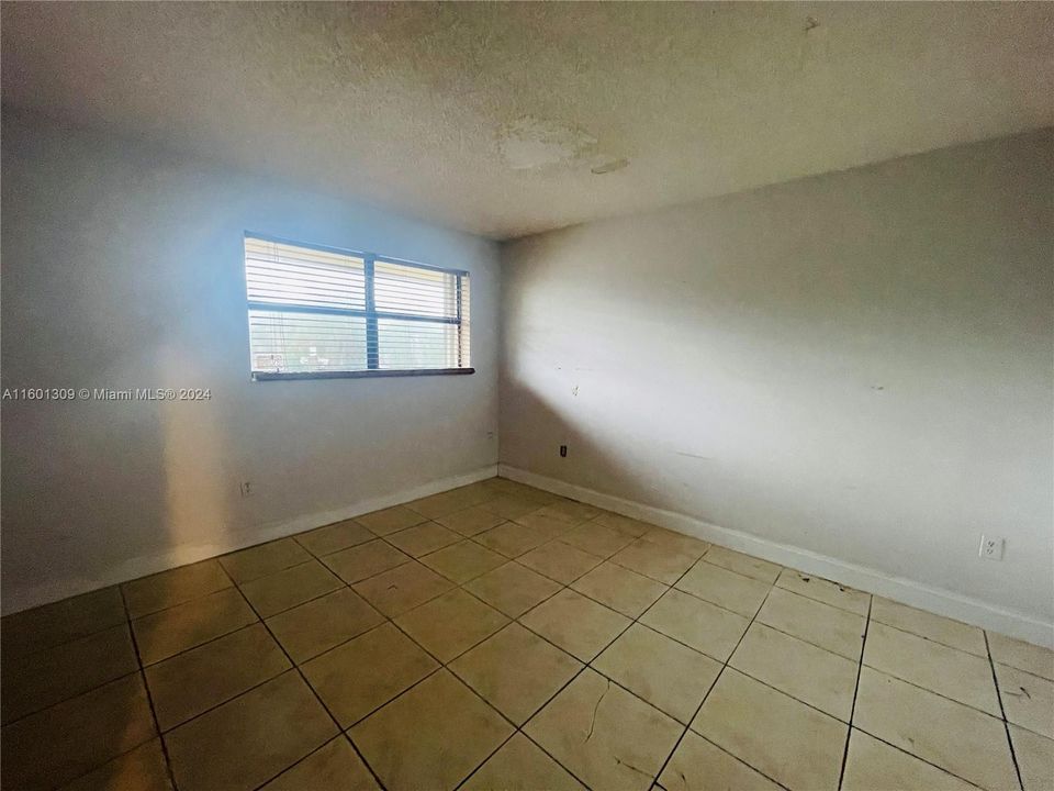 Primary Bedroom with Walk-In Closet and Bathroom Suite