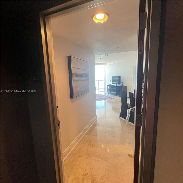 Foyer and Partial View of Dining Area