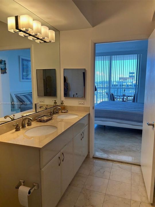 Master Bathroom and Partial View of Bedroom