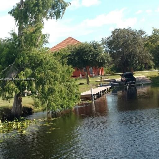 Picture of dock, ramp & guest house from the water