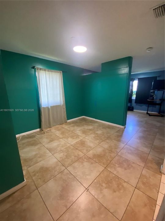 The room is split with a wall