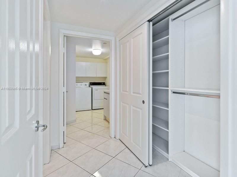 Large laundry room + 3 large storage closets in hallway